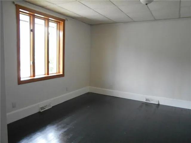 an empty room with windows