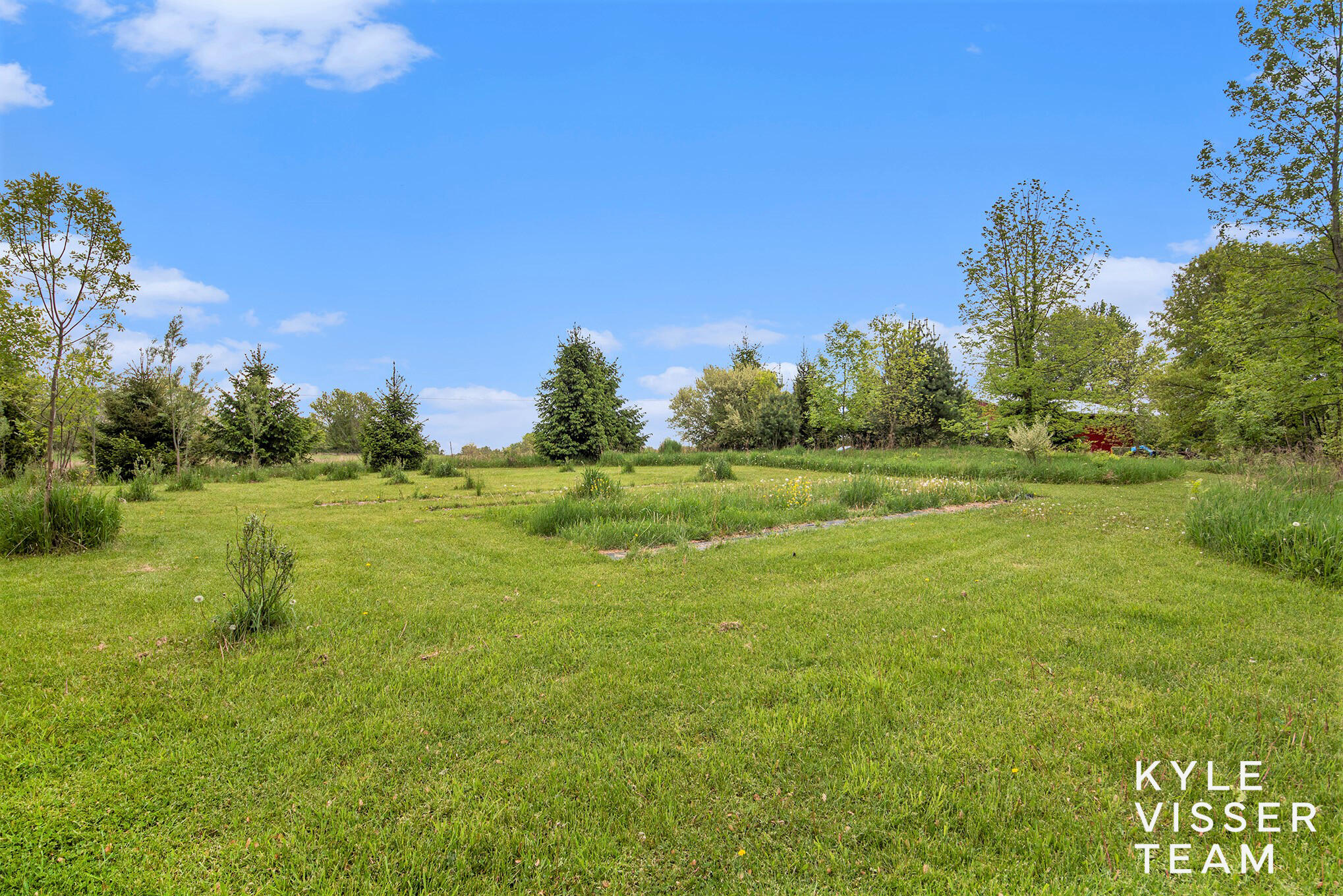 9020 5 Mile Road Northeast Ada, MI 49301 - Photo 33 of 42 Back Yard