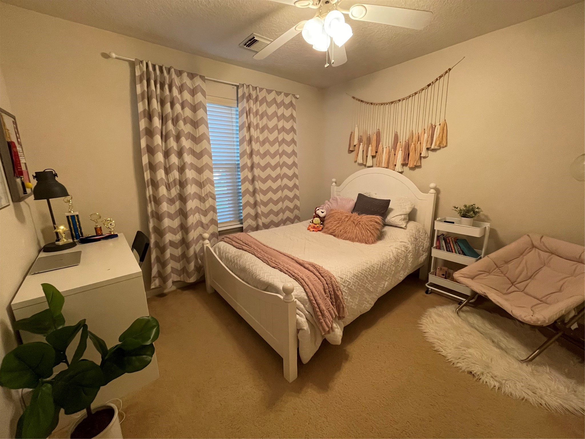3310 Legends Wild Drive Spring, TX 77386 - Photo 23 of 40 a bedroom with a bed and a couch