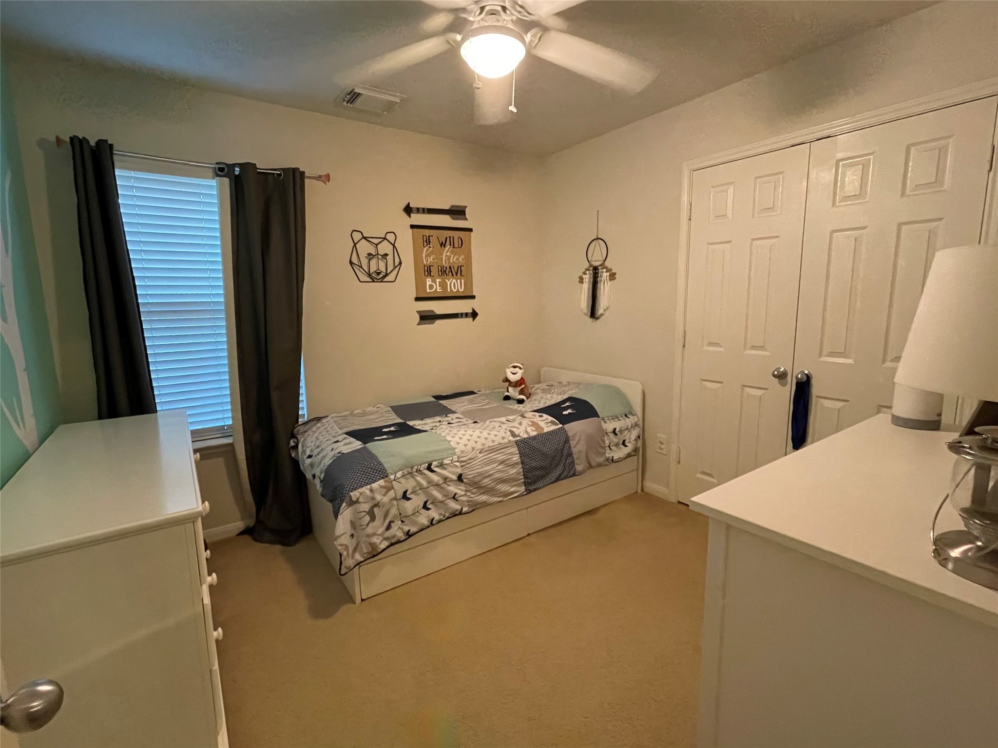 3310 Legends Wild Drive Spring, TX 77386 - Photo 24 of 40 a bed room with a bed and a chair