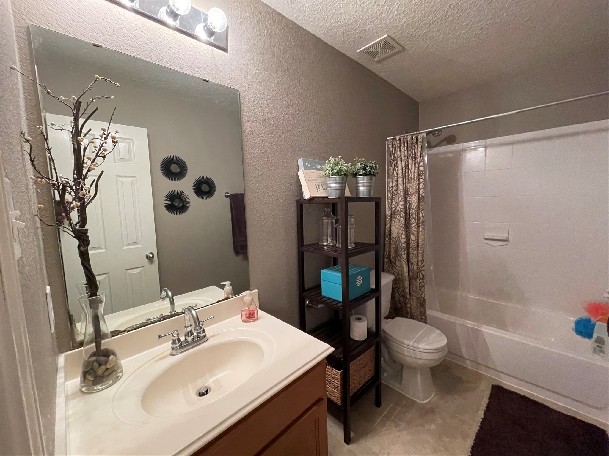 3310 Legends Wild Drive Spring, TX 77386 - Photo 26 of 40 a bathroom with a sink toilet and shower