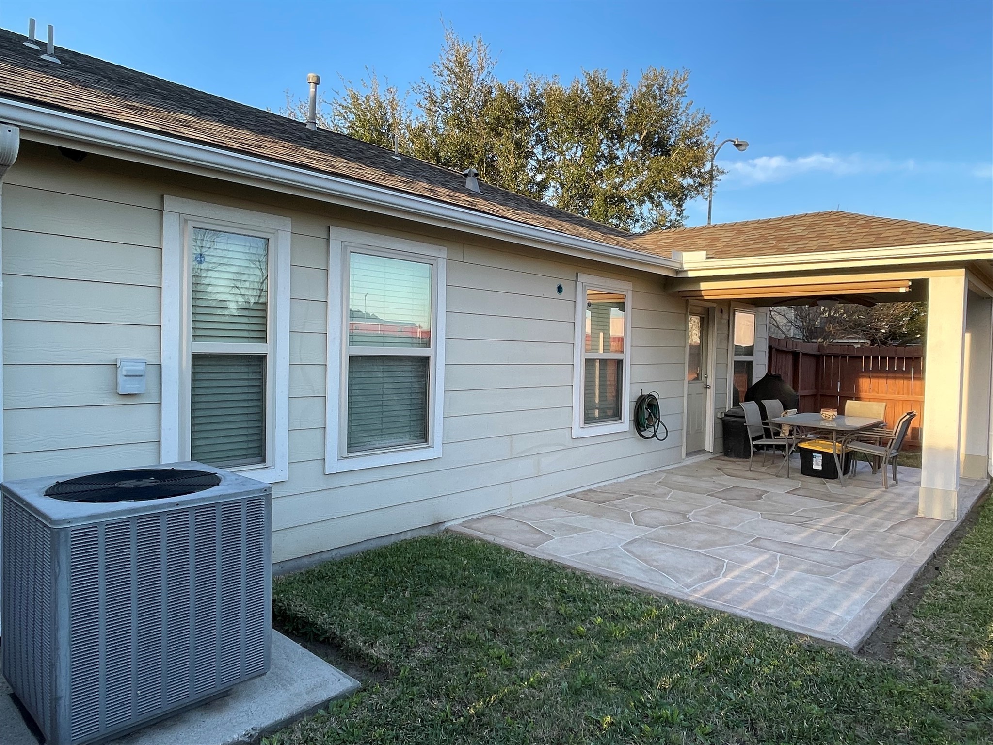 3310 Legends Wild Drive Spring, TX 77386 - Photo 28 of 40 a backyard of a house with barbeque oven table and chairs