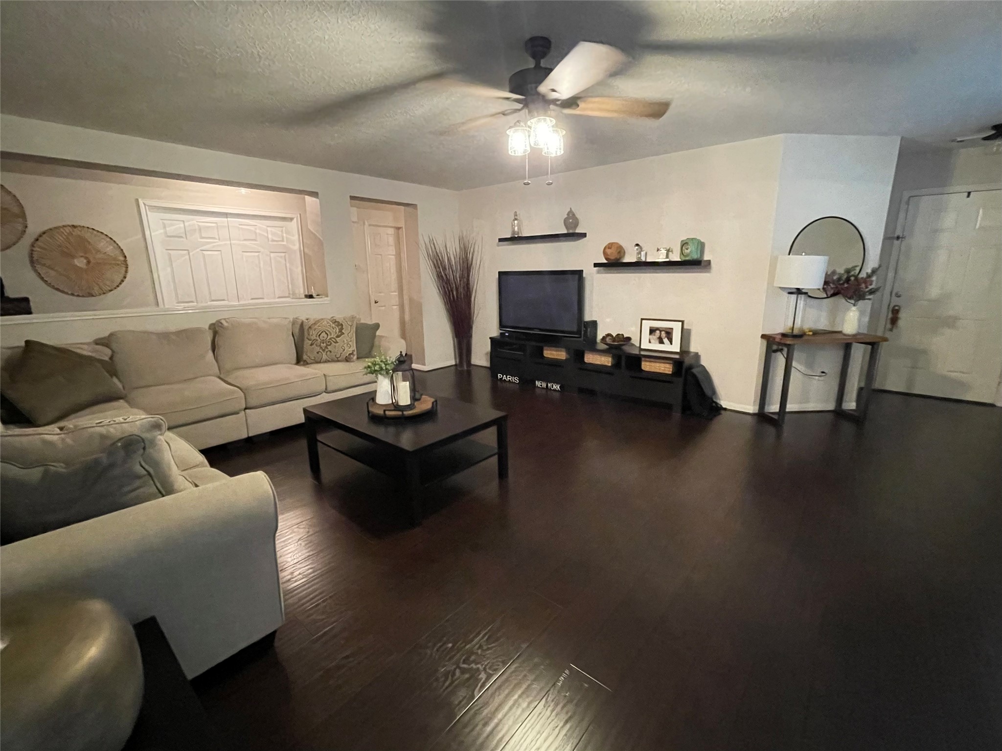 3310 Legends Wild Drive Spring, TX 77386 - Photo 8 of 40 a living room with furniture and a fireplace