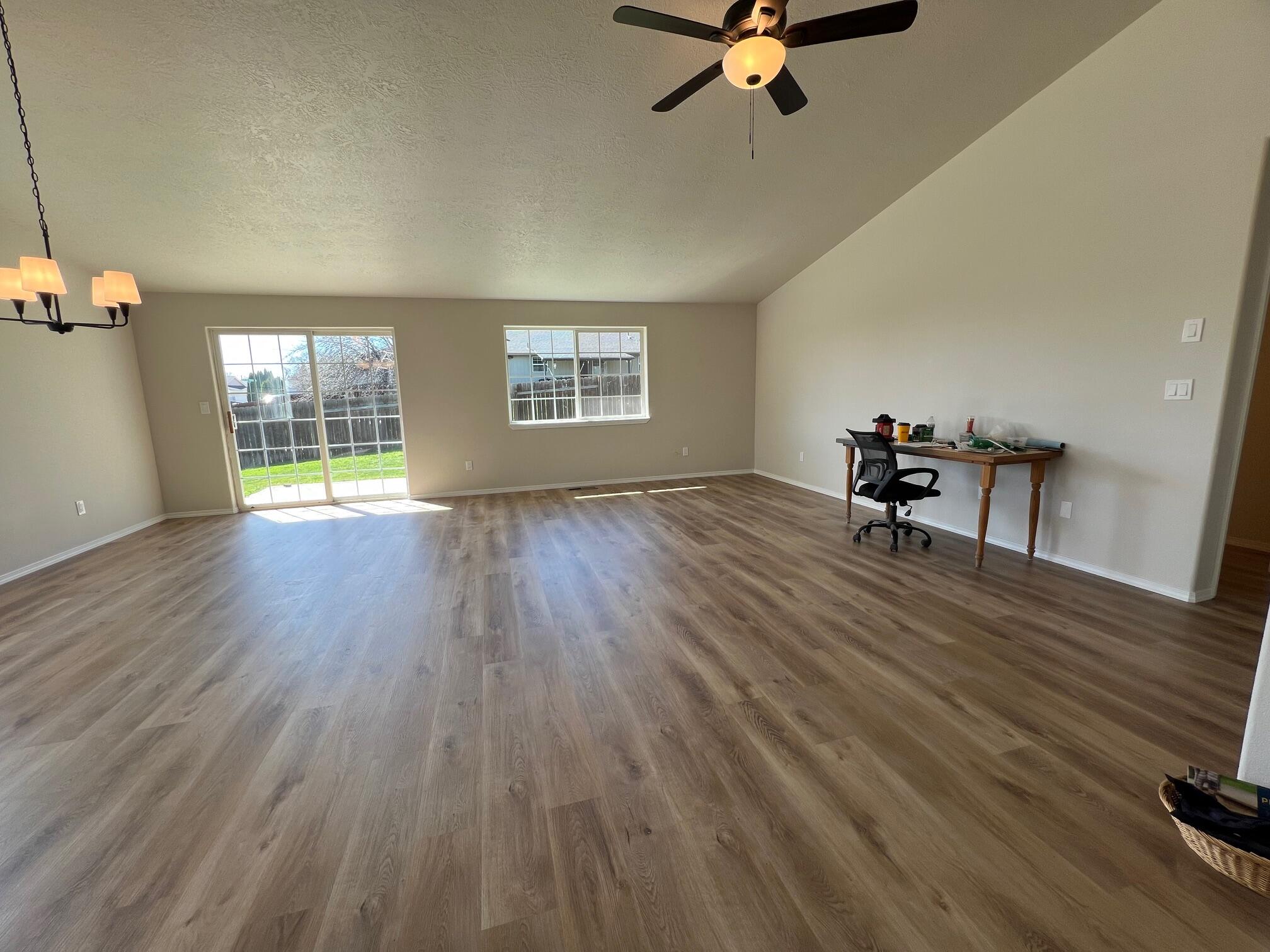 629 Deer Ridge Court Madras, OR 97741 - Photo 12 of 39 wooden floor that has a window in it