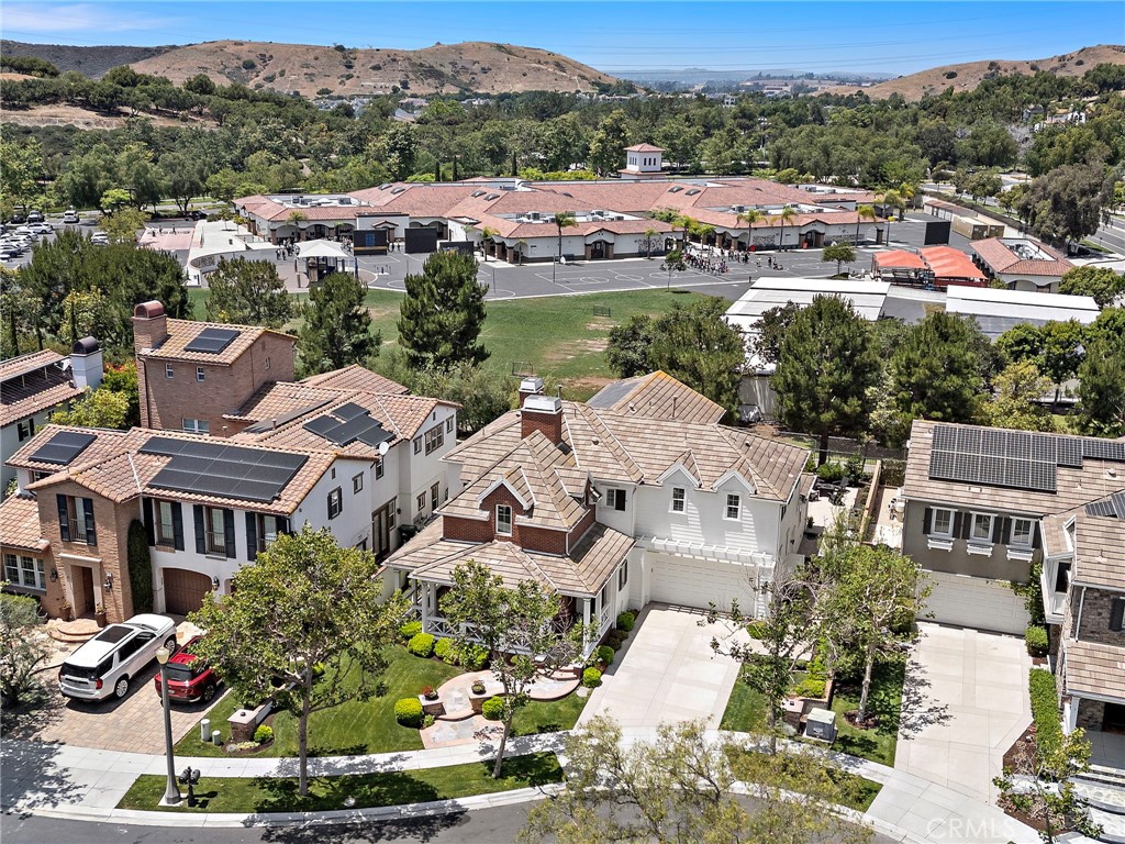 3 Tranquility Place Ladera Ranch, CA 92694 - Photo 55 of 63 an aerial view of a house with a lake view