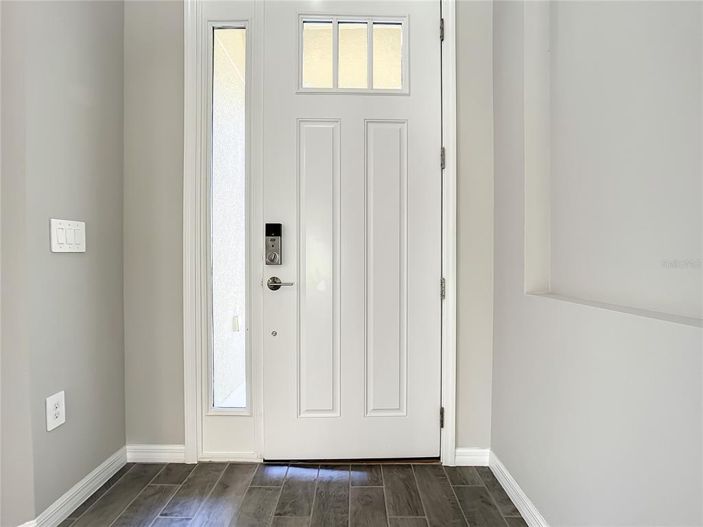 2675 Ridgetop Lane Clermont, FL 34711 - Photo 14 of 56 a view of an front door