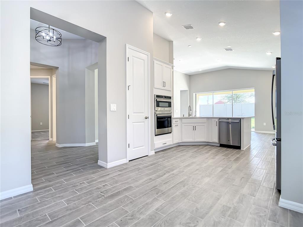 2675 Ridgetop Lane Clermont, FL 34711 - Photo 28 of 56 a view of a kitchen with a sink and a window