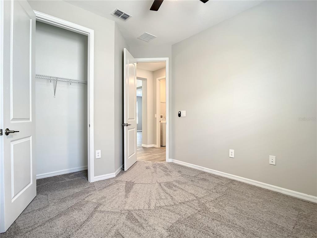 2675 Ridgetop Lane Clermont, FL 34711 - Photo 40 of 56 a view of an empty room