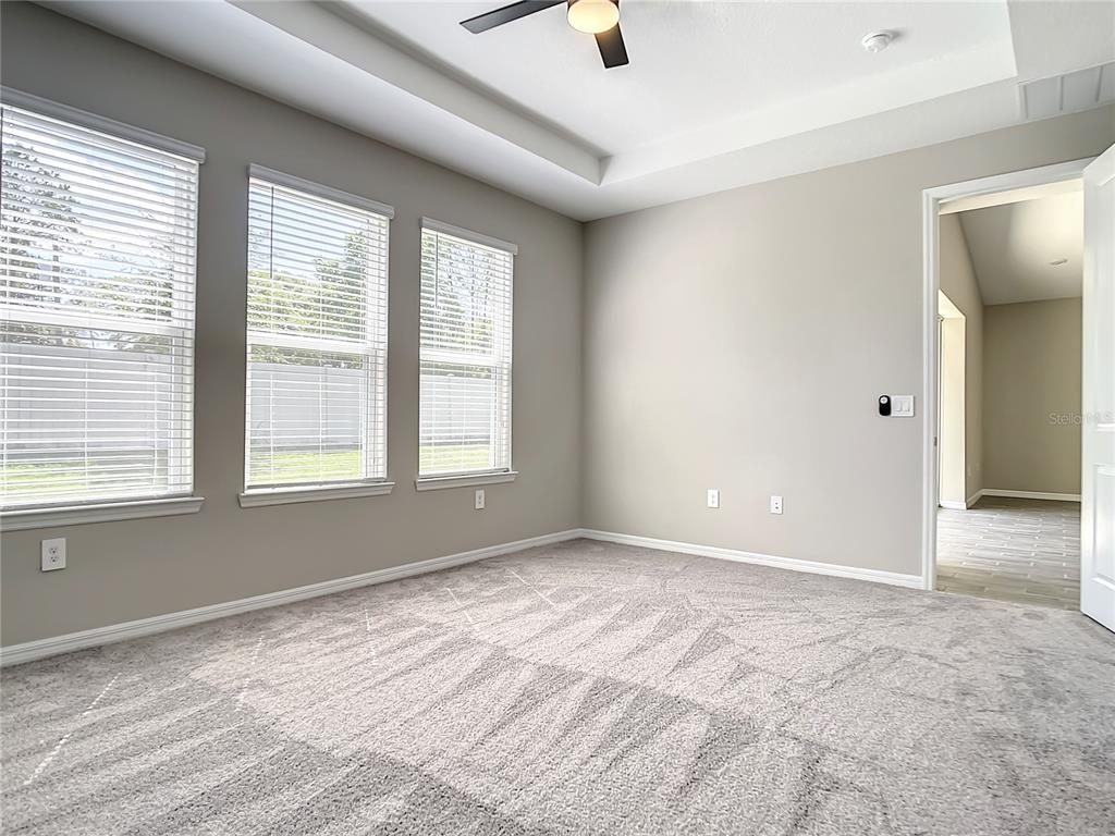 2675 Ridgetop Lane Clermont, FL 34711 - Photo 44 of 56 a view of an empty room with a window