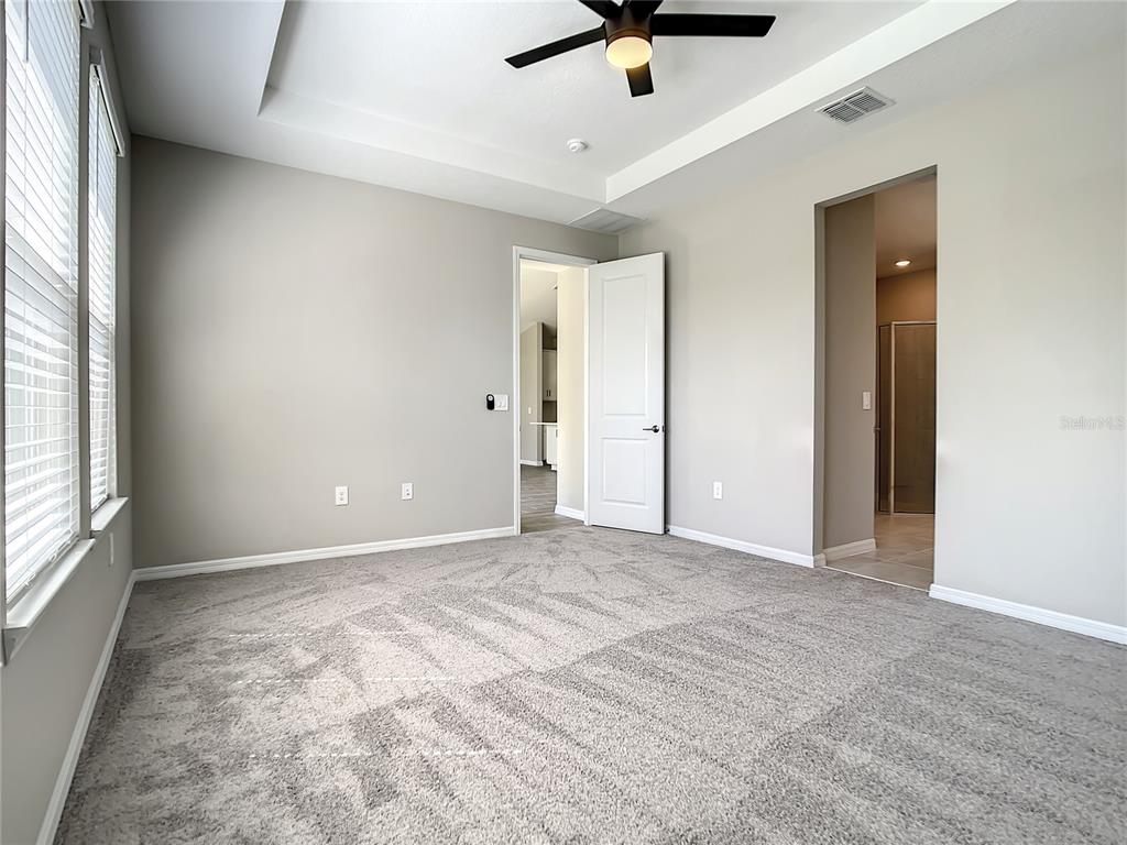 2675 Ridgetop Lane Clermont, FL 34711 - Photo 45 of 56 a view of an empty room with a window