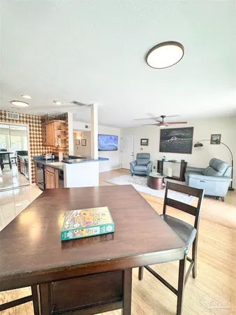 a living room with furniture and a table