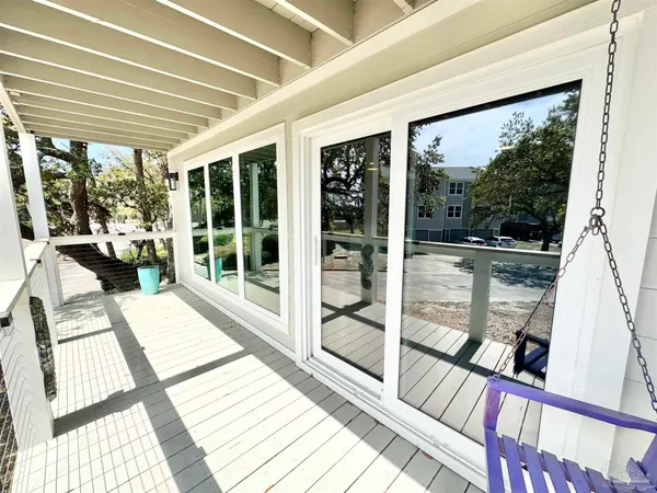 a view of a balcony with flat screen tv