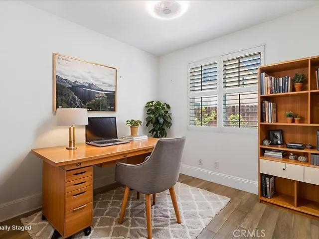 a bathroom with a toilet and a bathtub