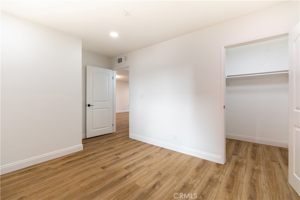 450 East 4th Street, Unit 237 Santa Ana, CA 92701 - Photo 16 of 25 wooden floor in an empty room