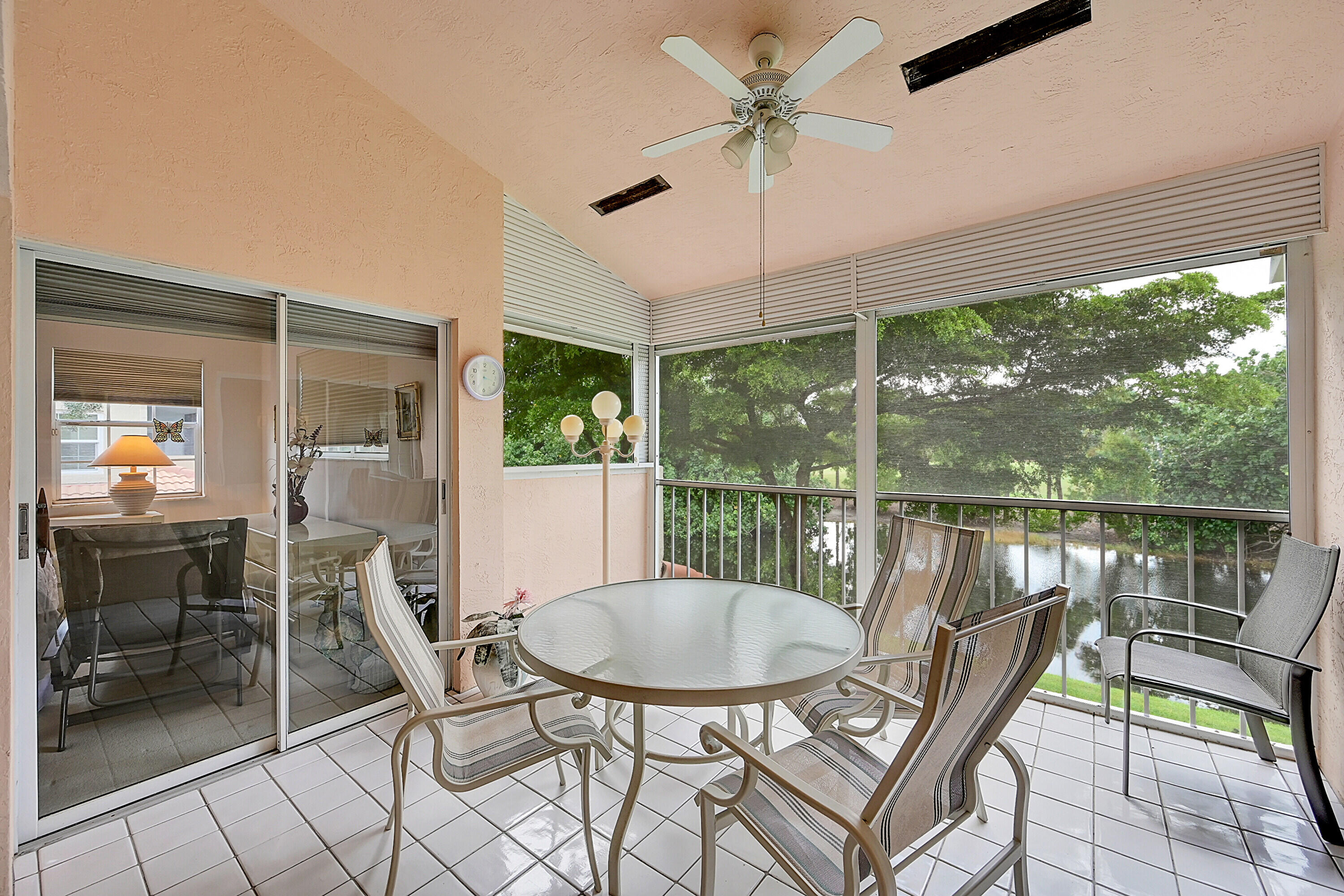 17270 Boca Club Boulevard, Unit 1702 Boca Raton, FL 33487 - Photo 11 of 41 a view of a dining room with furniture window and outside view