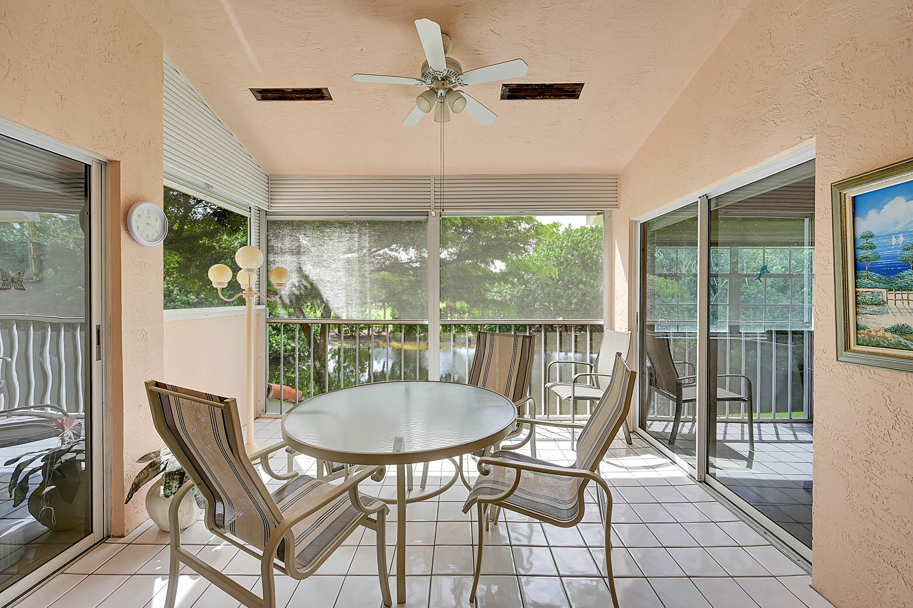 17270 Boca Club Boulevard, Unit 1702 Boca Raton, FL 33487 - Photo 10 of 41 a view of a dining room with furniture window and outside view
