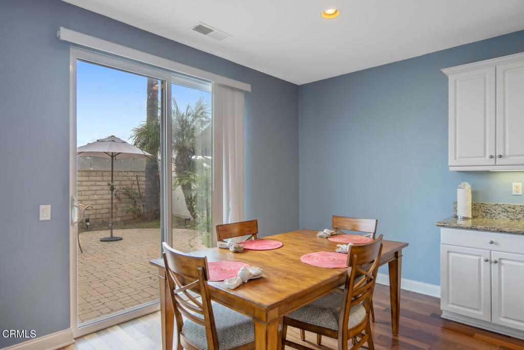 2920 Naples Drive Oxnard, CA 93035 - Photo 12 of 28 a view of a dining room with furniture window and wooden floor