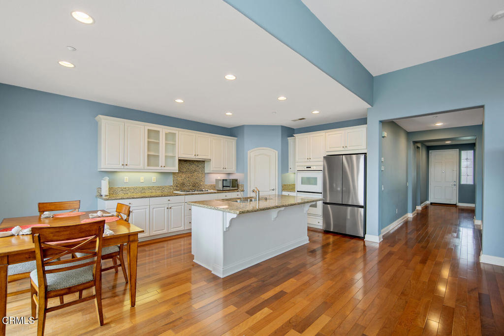 2920 Naples Drive Oxnard, CA 93035 - Photo 14 of 28 a kitchen with stainless steel appliances granite countertop a refrigerator and a stove top oven