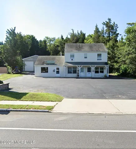 a view of house with a outdoor space and street view