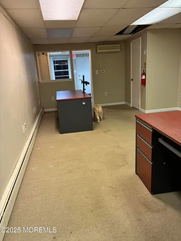 a view of a livingroom with furniture