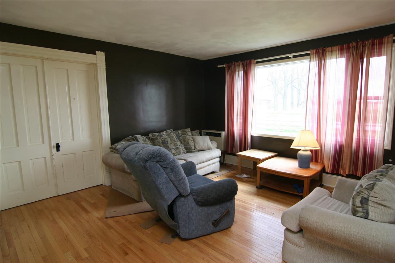 1616 Manchester Road South Beloit, IL 61080 - Photo 20 of 25 a living room with furniture and large window