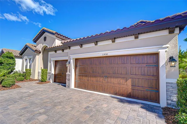 a view of a house with a garage