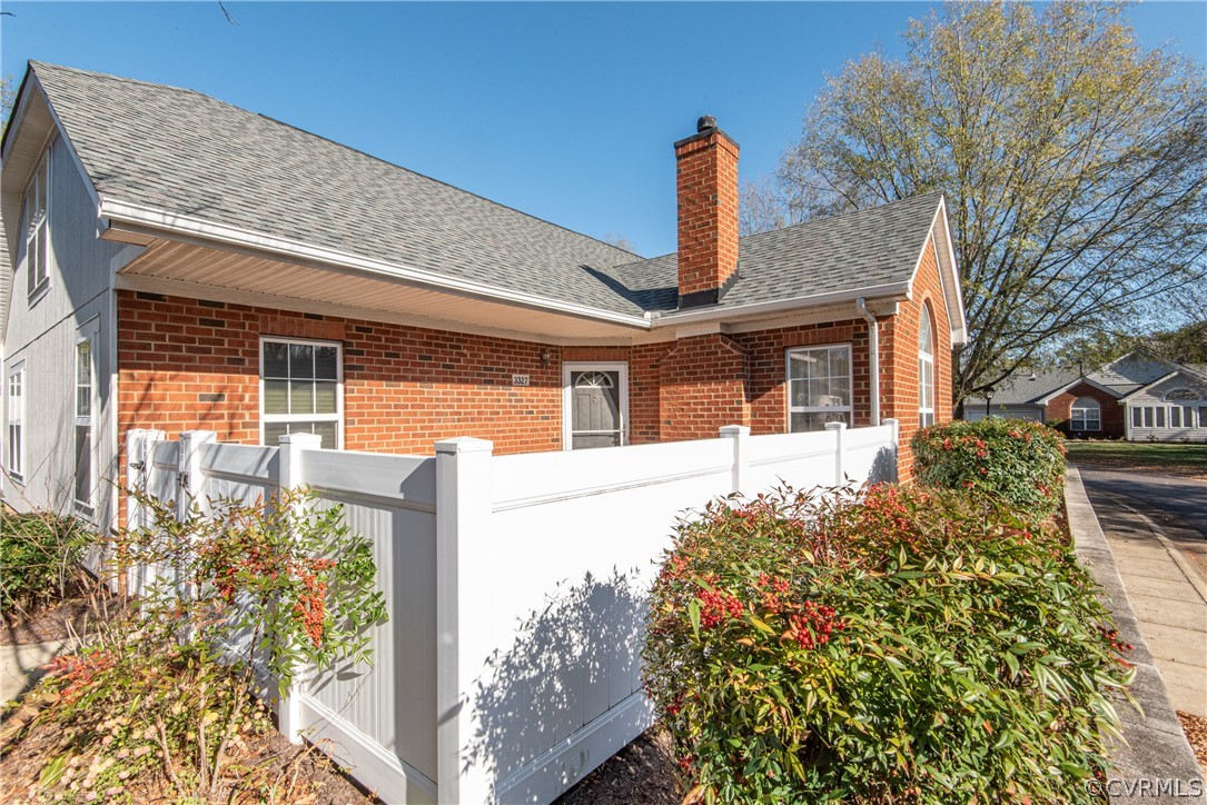 3327 Stone Manor Circle, Unit 9B Chester, VA 23831 - Photo 1 of 27 a front view of a house with garden