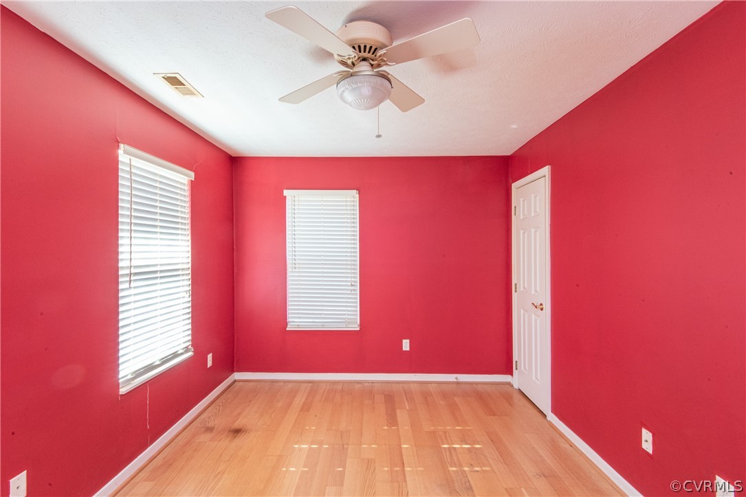 3327 Stone Manor Circle, Unit 9B Chester, VA 23831 - Photo 18 of 27 a view of an empty room with a window