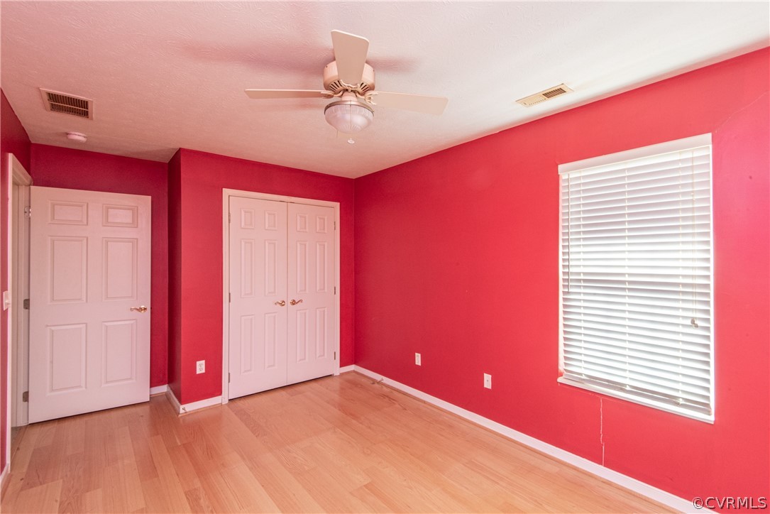 3327 Stone Manor Circle, Unit 9B Chester, VA 23831 - Photo 20 of 27 a view of an empty room with a window