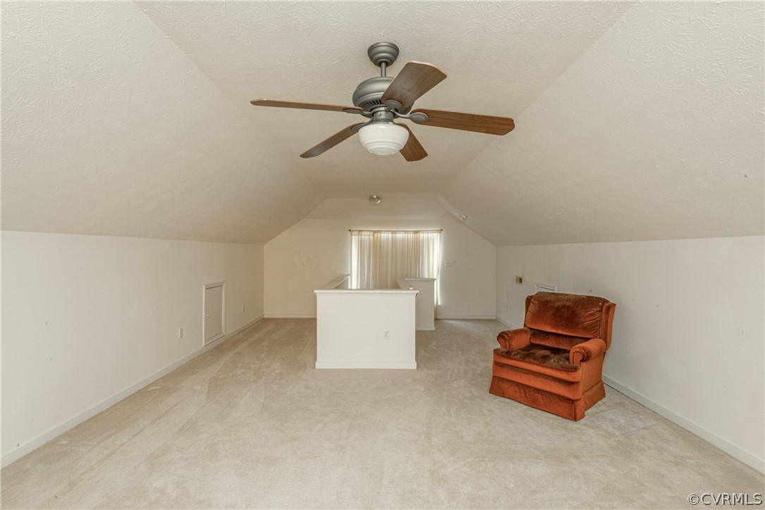 3327 Stone Manor Circle, Unit 9B Chester, VA 23831 - Photo 23 of 27 a room with furniture and a ceiling fan