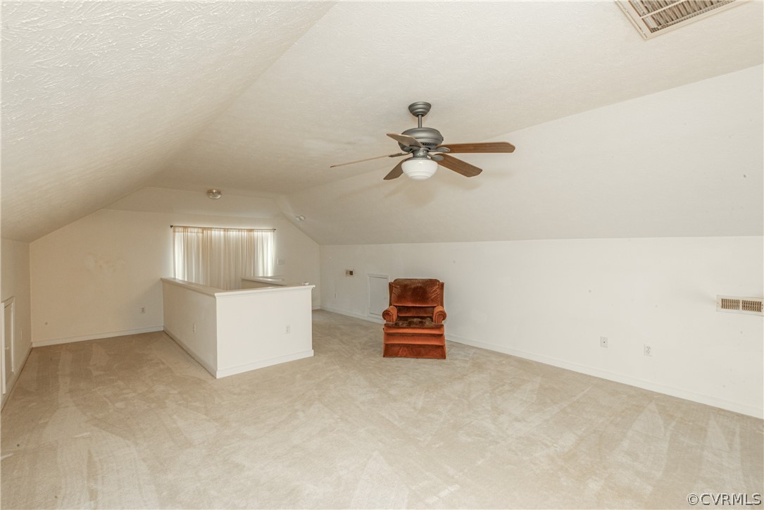 3327 Stone Manor Circle, Unit 9B Chester, VA 23831 - Photo 24 of 27 an empty room with windows and fan