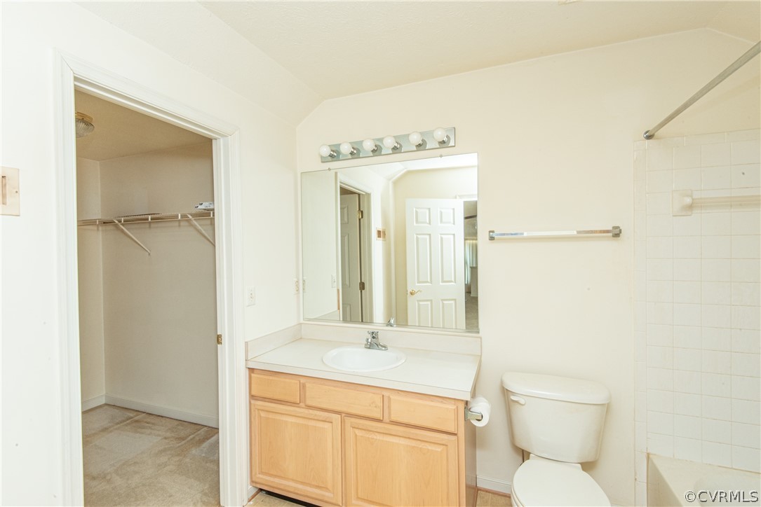 3327 Stone Manor Circle, Unit 9B Chester, VA 23831 - Photo 25 of 27 a bathroom with a granite countertop sink a toilet and a mirror