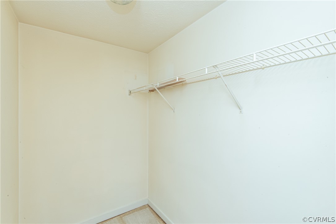 3327 Stone Manor Circle, Unit 9B Chester, VA 23831 - Photo 27 of 27 a view of a room with racks on the wall