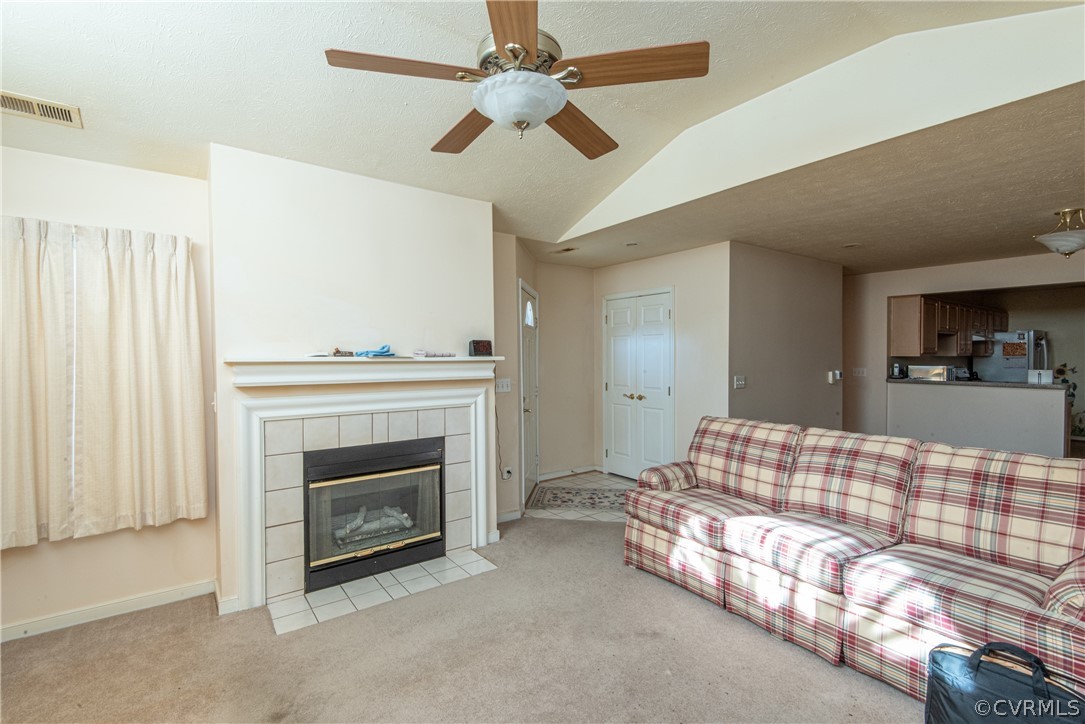 3327 Stone Manor Circle, Unit 9B Chester, VA 23831 - Photo 6 of 27 a bedroom with a bed and a fireplace