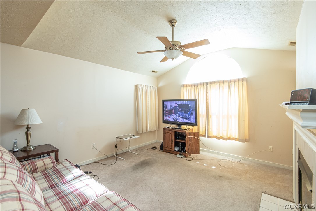 3327 Stone Manor Circle, Unit 9B Chester, VA 23831 - Photo 8 of 27 a bedroom with a bed and a chandelier