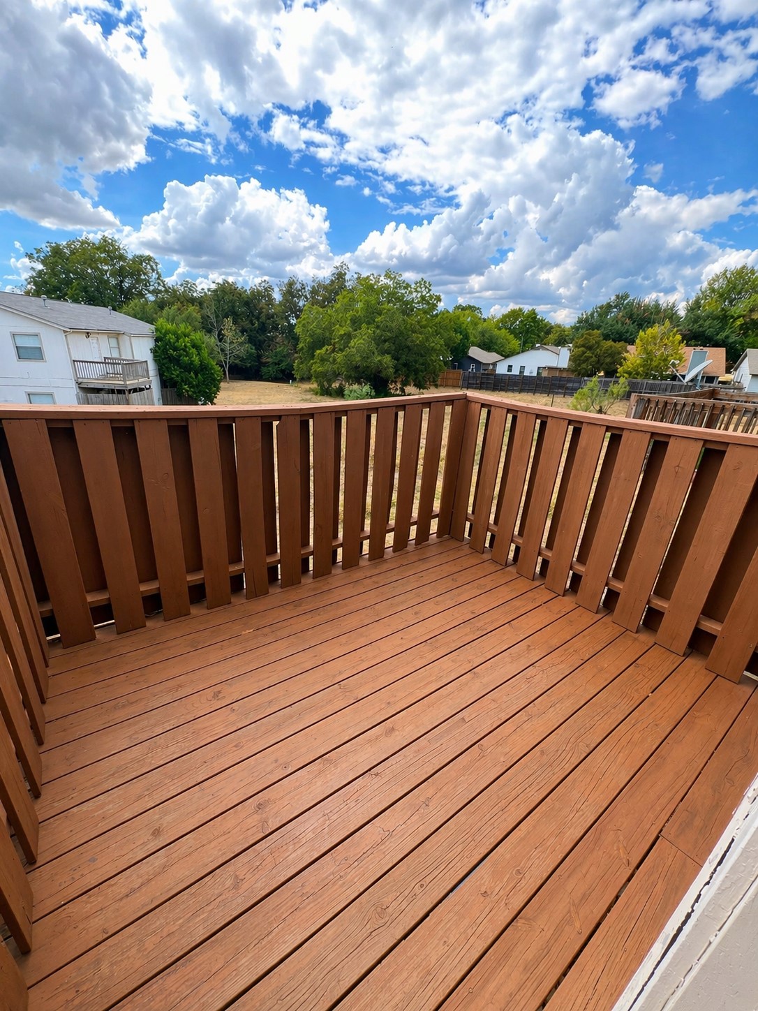 2307 Rachael Court, Unit D Austin, TX 78748 - Photo 7 of 7 a balcony with wooden floor