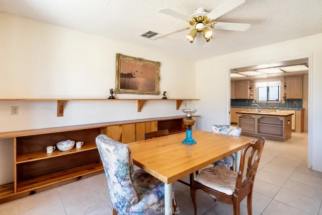 a bathroom with a sink and a large mirror