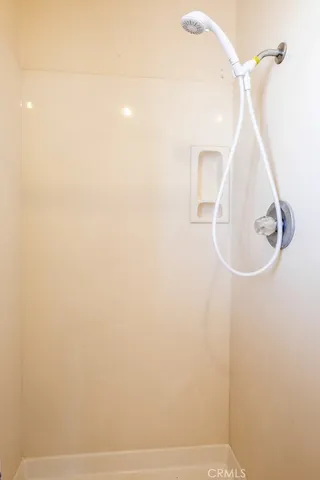 a view of a house with swimming pool and sitting area