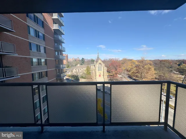 a view of a building from a balcony
