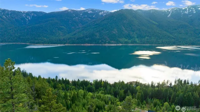 a view of a lake with a yard