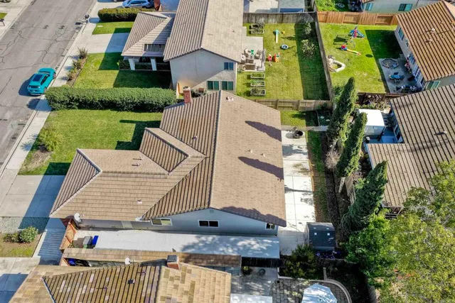 a view of outdoor space with garden and trees