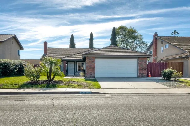 a view of a house with backyard porch and patio