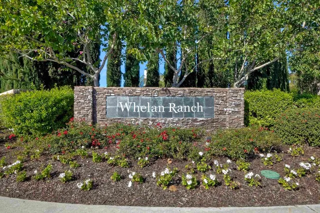 a view of a swimming pool with a yard