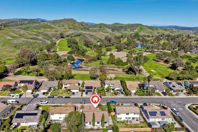 an aerial view of multiple house