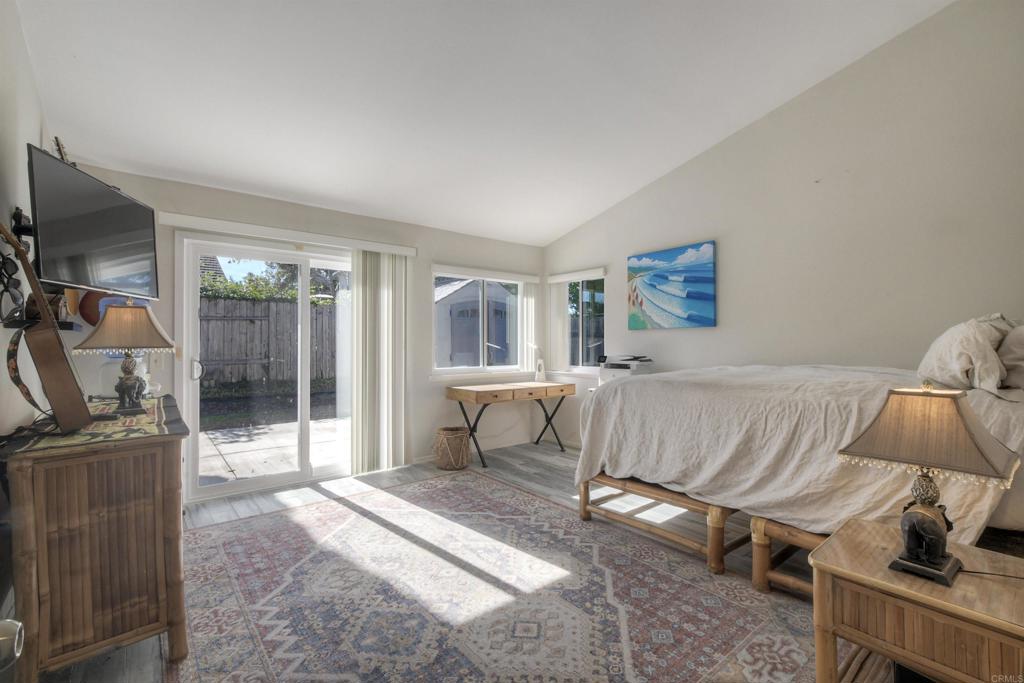 4413 Point Degada Oceanside, CA 92058 - Photo 9 of 31 a living room with furniture and a flat screen tv
