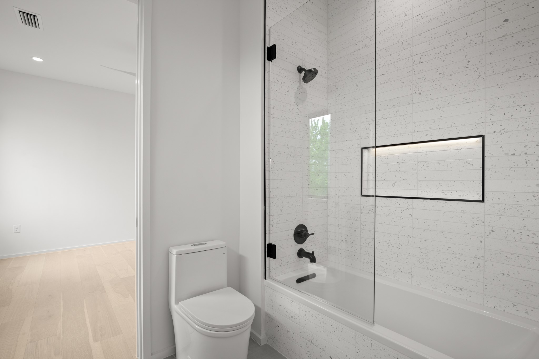 2215 South 3rd Street Austin, TX 78704 - Photo 32 of 38 a bathroom with a toilet and a bathtub