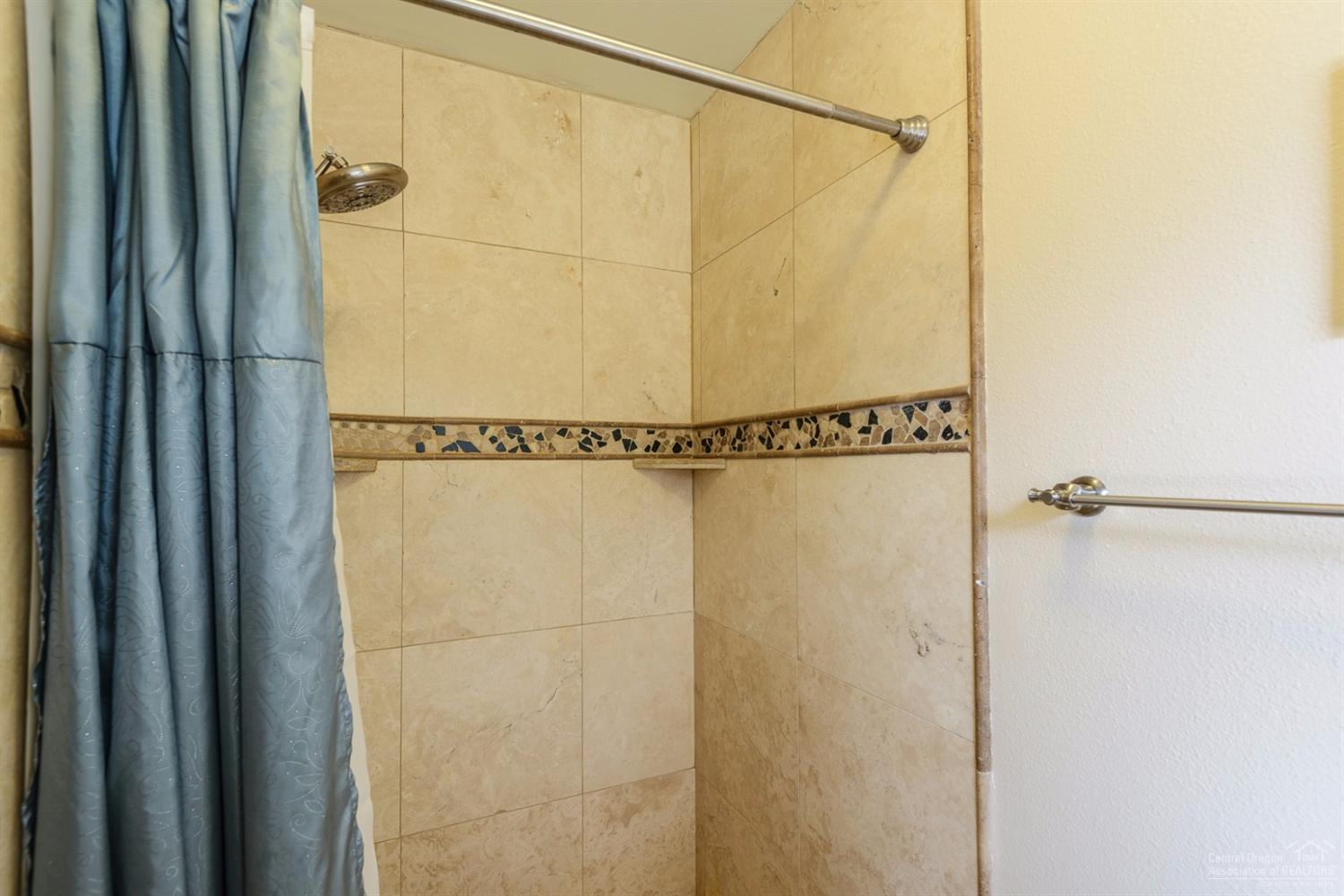 60030 Navajo Road Bend, OR 97702 - Photo 13 of 20 a bathroom with a shower