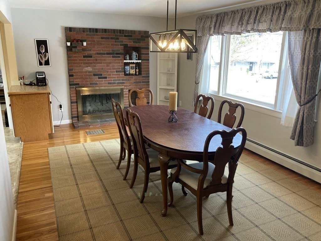 17 Adams Road Grafton, MA 01519 - Photo 13 of 42 a view of a dining room with furniture window and outside view