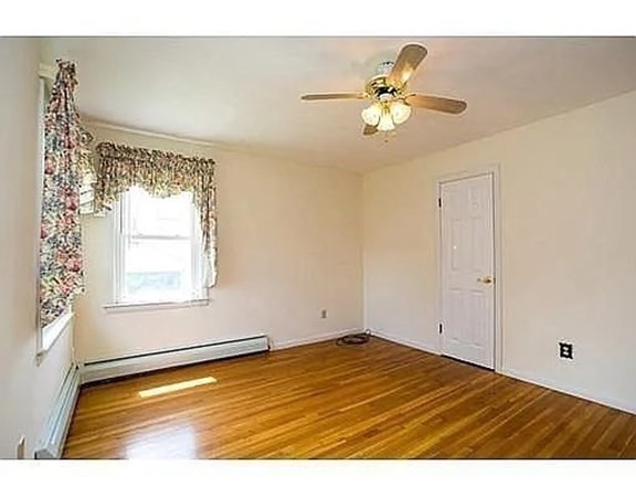 17 Adams Road Grafton, MA 01519 - Photo 28 of 42 a view of an empty room and window