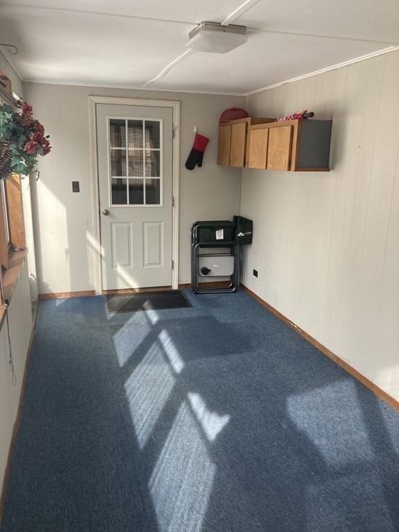 17 Adams Road Grafton, MA 01519 - Photo 35 of 42 a front view of a house with entryway